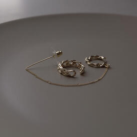 Two gold ear cuffs