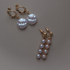 Two pearl earrings